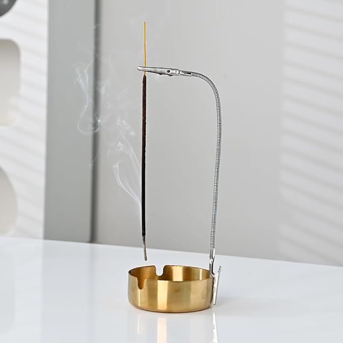 Modern Incense Holder with Flexible Metal Stand, Silver Ash Collector Base, Minimalist Design for Home Meditation and Aromatherapy.